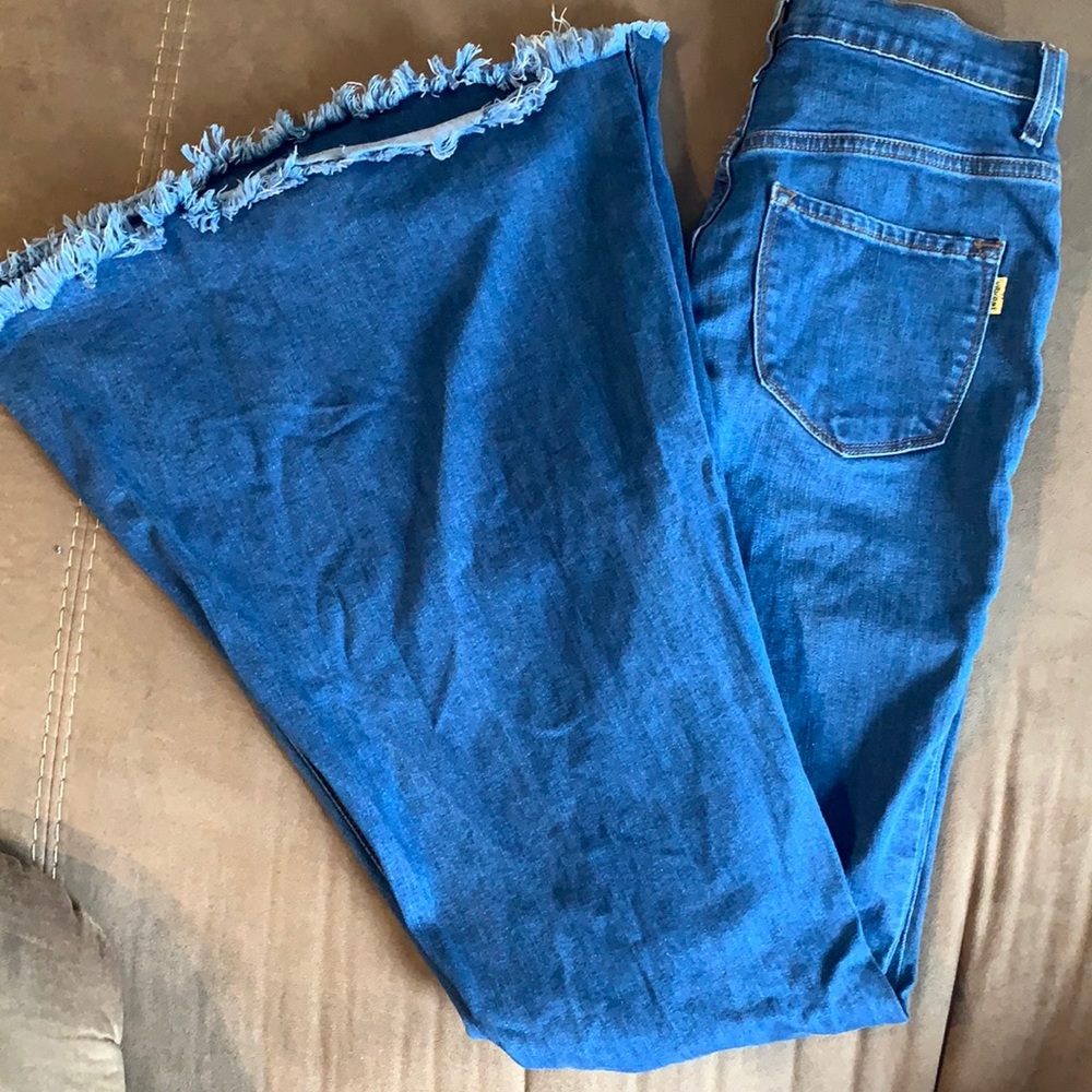 Bell bottom rip jeans
